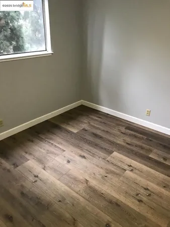 a view of a room that has a window