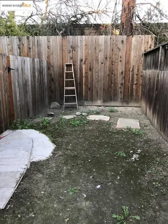 a fire hydrant in the middle of a yard