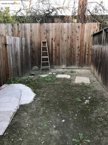a fire hydrant in the middle of a yard