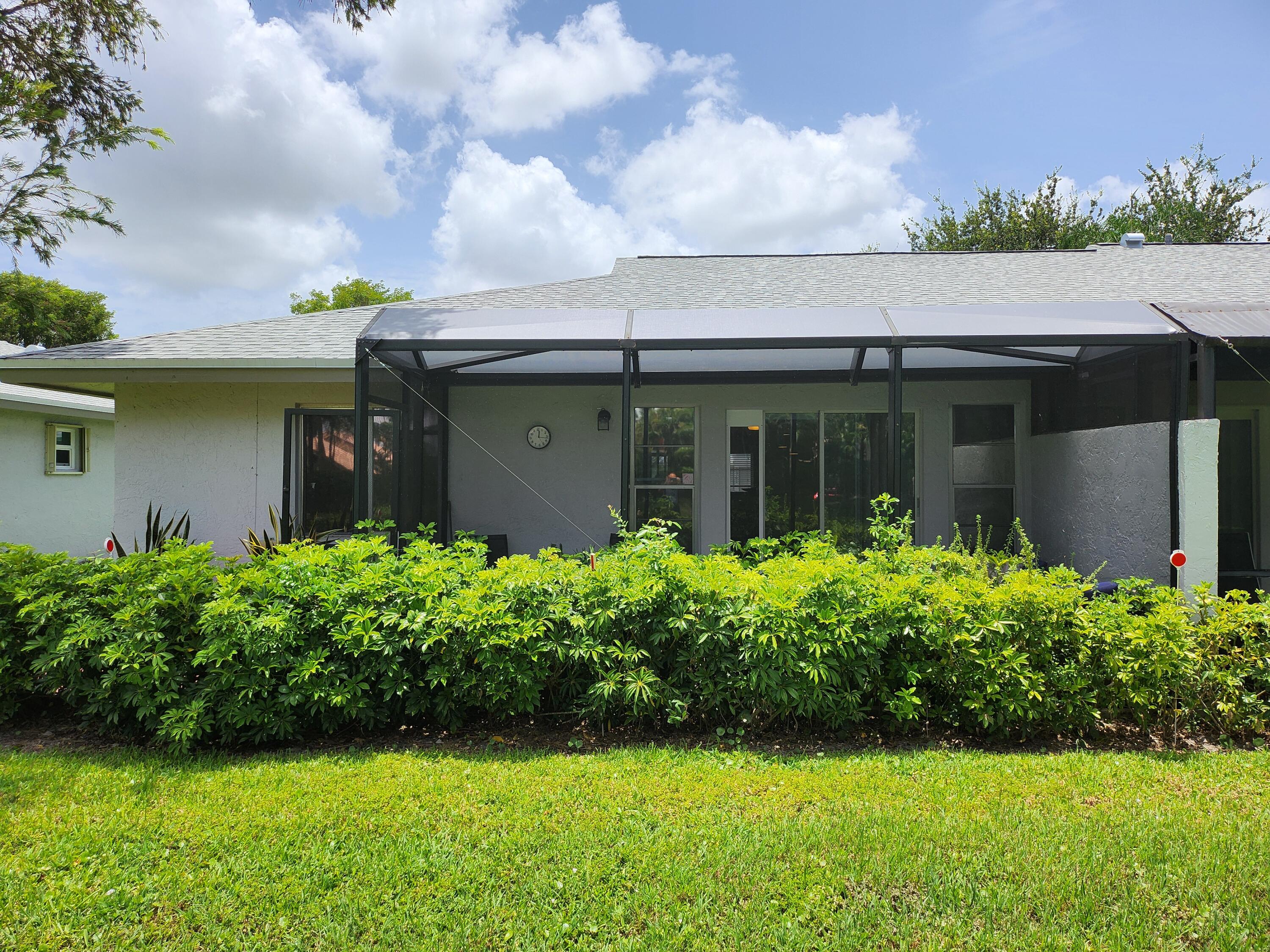 8951 Sunnywood Place Boca Raton, FL 33496 - Photo 28 of 47 8951 SUNNYWOOD PL Boca back of home