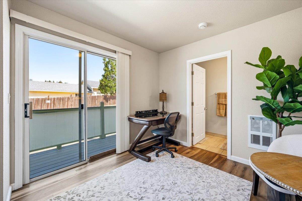 232 Upper Slate Creek Road Grass Valley, CA 95945 - Photo 14 of 48 a view of a workspace with furniture and a window