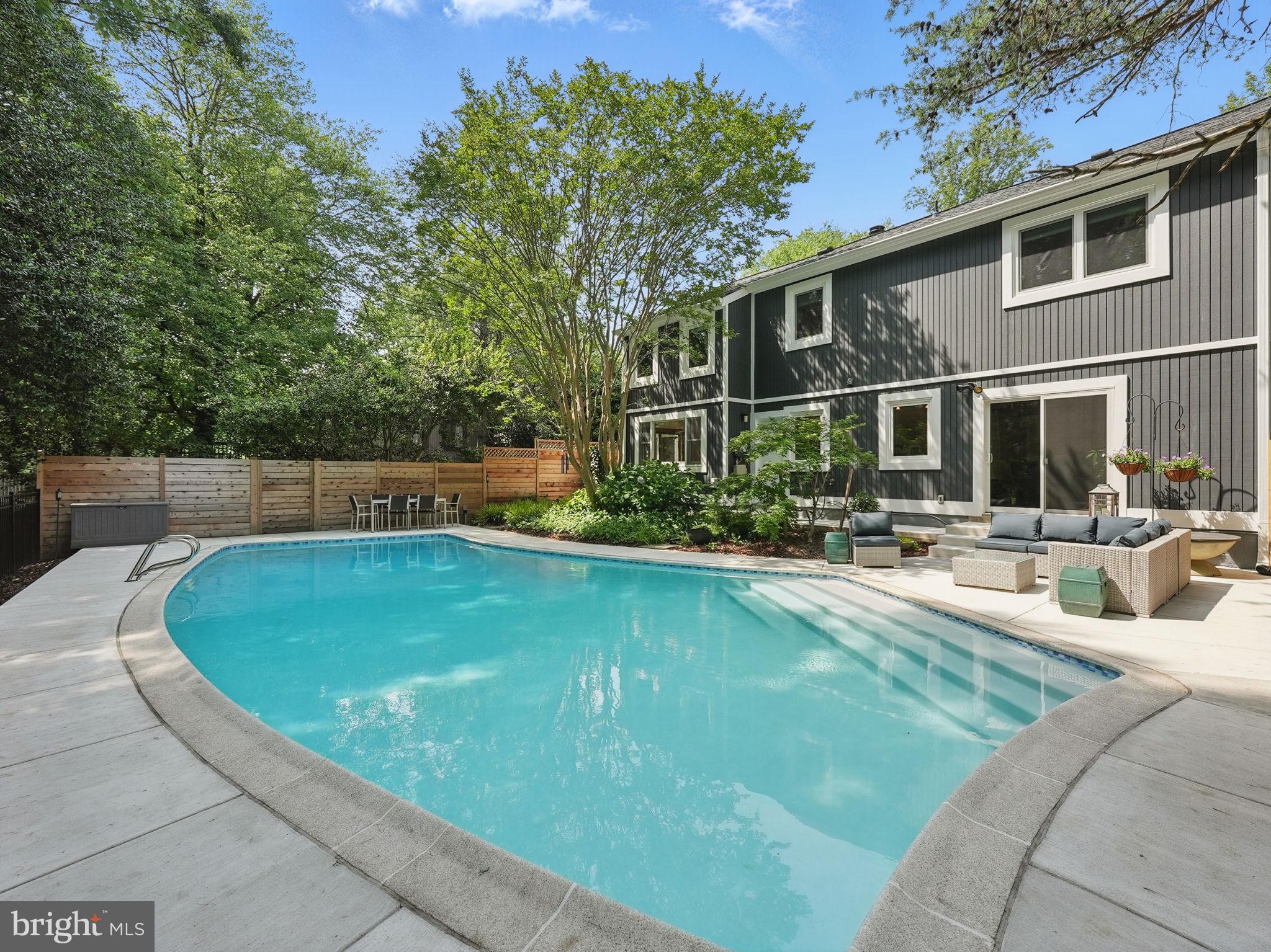 11817 Blue Spruce Road Reston, VA 20191 - Photo 58 of 62 concrete pool decking, patio and front porch 2024