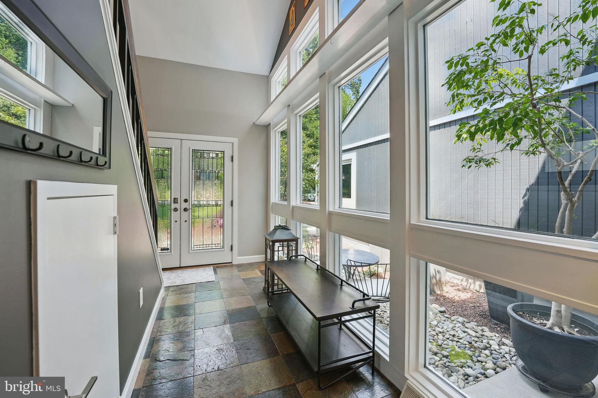 11817 Blue Spruce Road Reston, VA 20191 - Photo 9 of 62 Wall of windows overlooking the garden