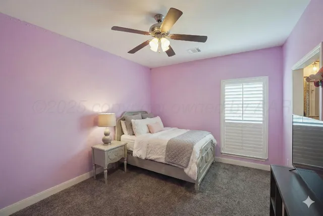 a bathroom with a sink vanity granite and a mirror