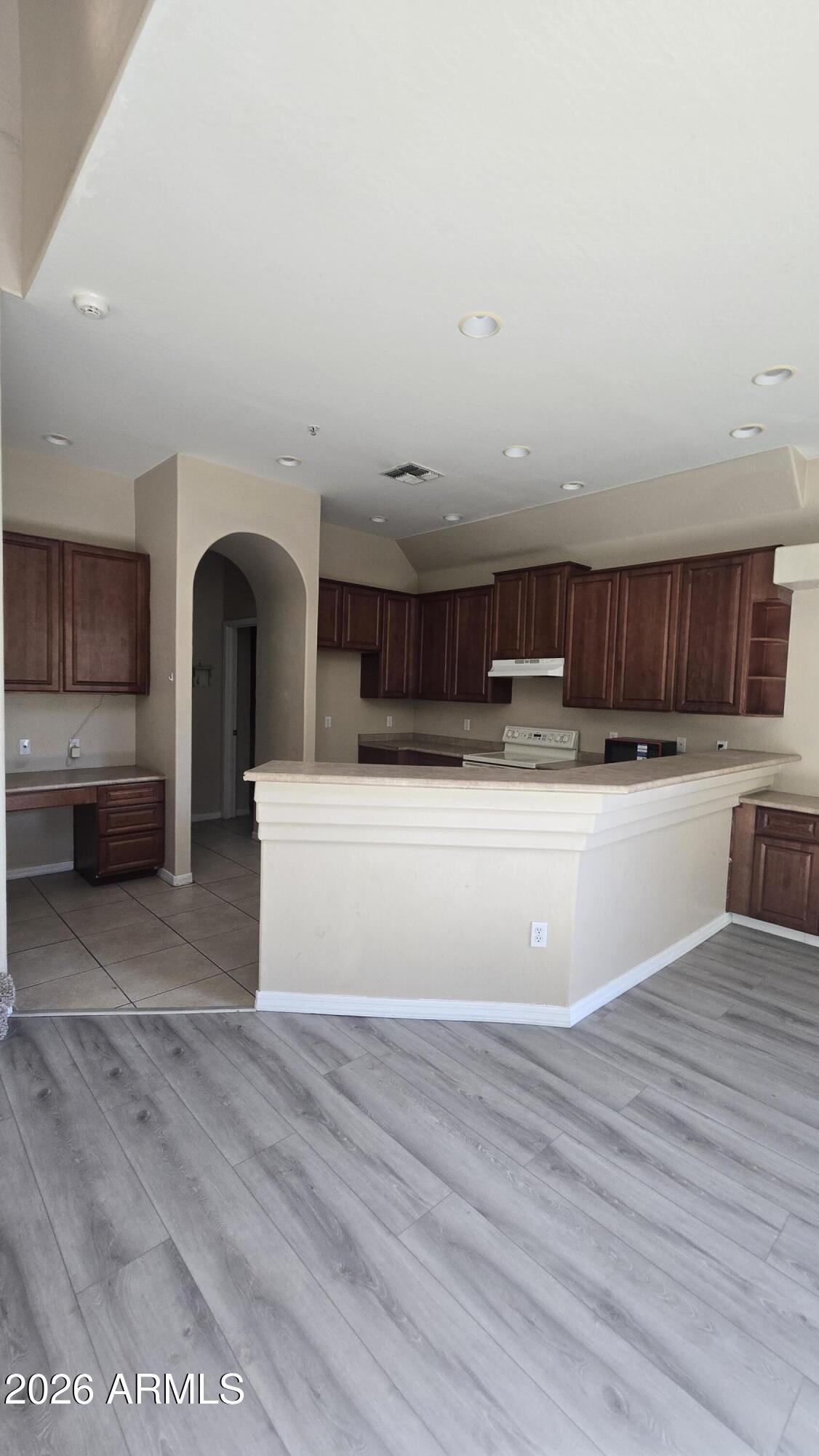 7528 North 19th Avenue, Unit 9 Phoenix, AZ 85021 - Photo 12 of 18 a view of a kitchen with a sink and cabinets