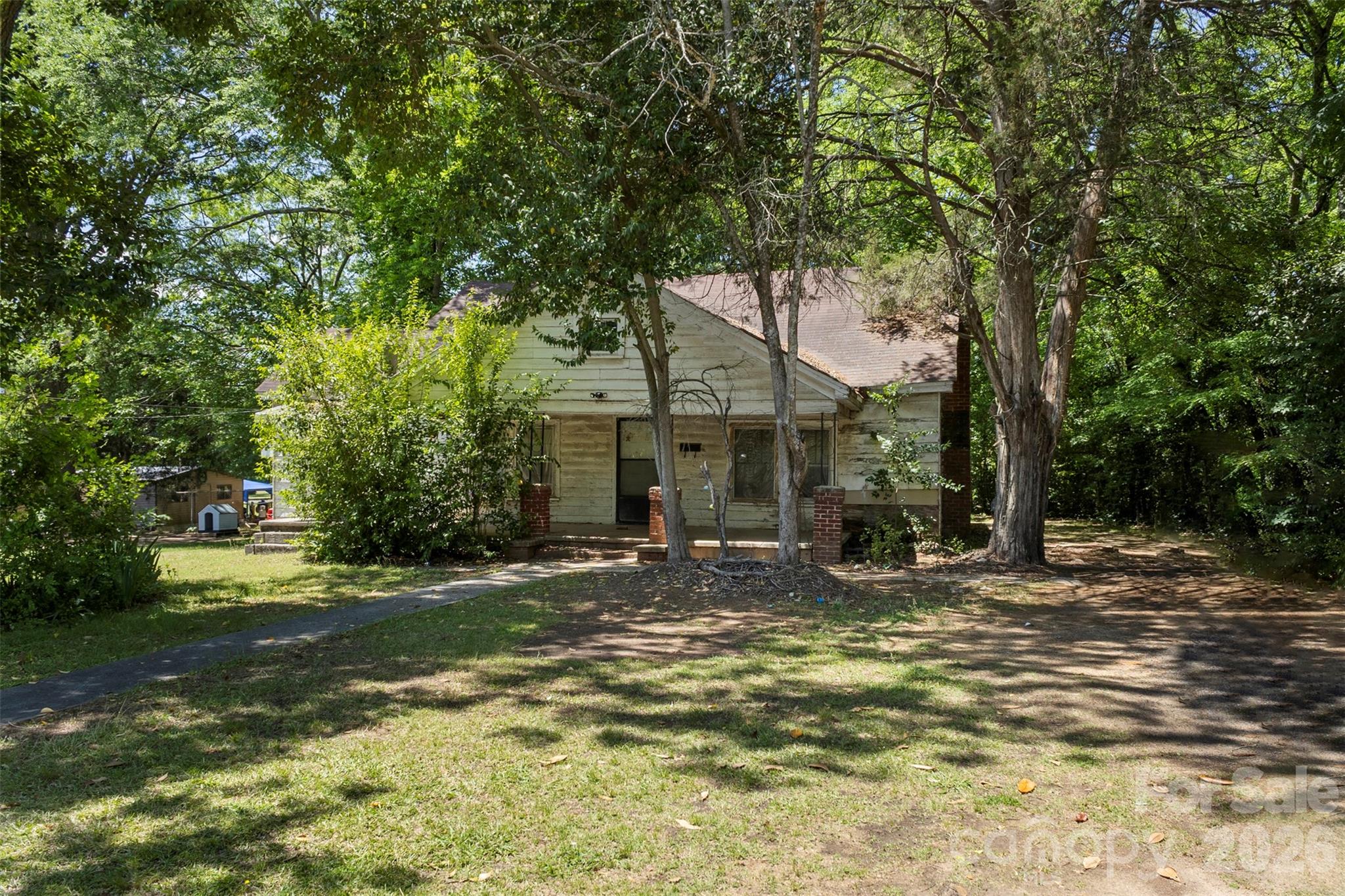 154 Loomis Street Chester, SC 29706 - Photo 4 of 5 a view of a house with a tree in a yard