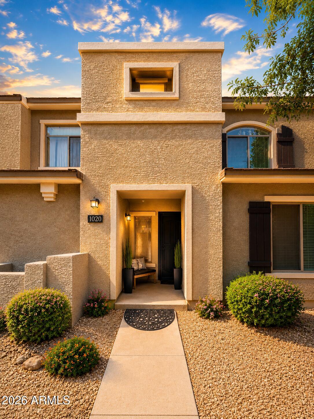 2150 West Alameda Road, Unit 1020 Phoenix, AZ 85085 - Photo 3 of 35 a view of a house with a yard