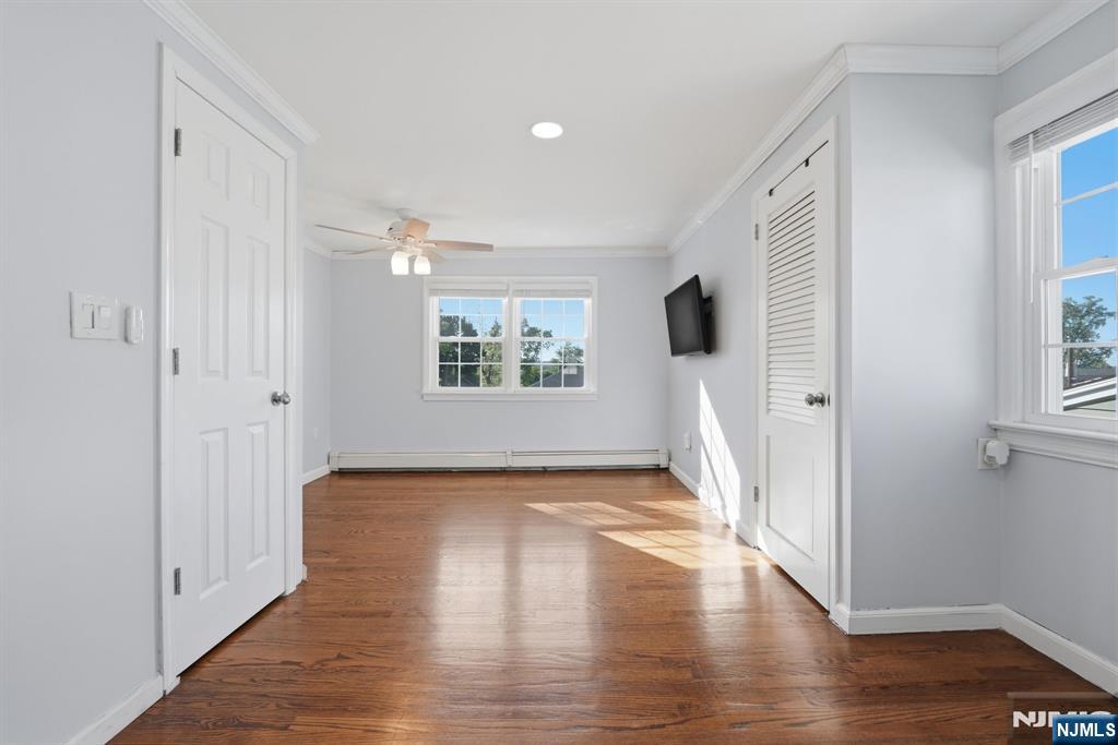 44 Alpine Place Kearny, NJ 07032 - Photo 30 of 50 a view of a livingroom with wooden floor and window