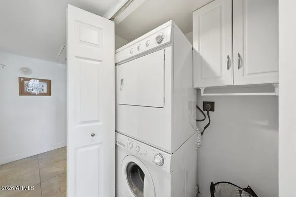 an aerial view of a house with a lake view
