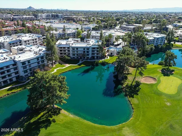 a room with gym equipment and a large window