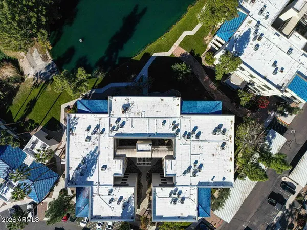 a view of a park with a house