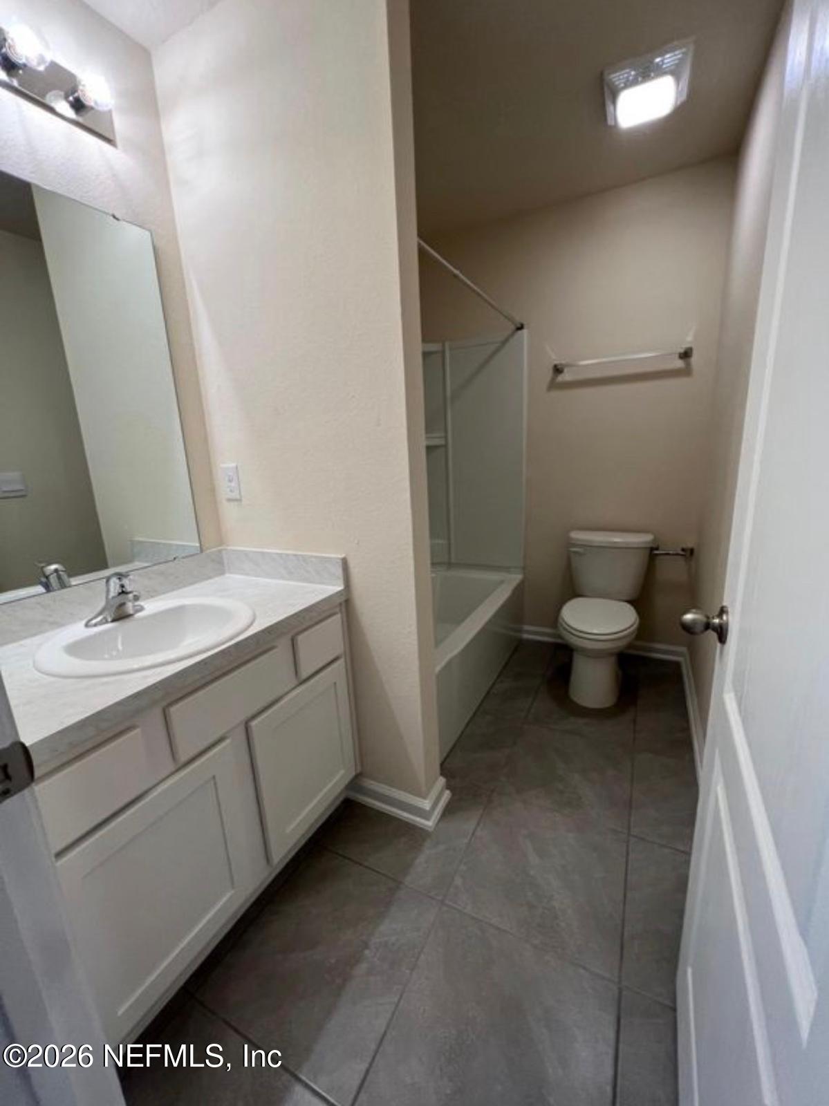 59 Sunnyvale Street St. Augustine, FL 32095 - Photo 12 of 22 a bathroom with a sink and a toilet