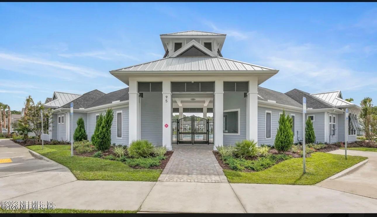59 Sunnyvale Street St. Augustine, FL 32095 - Photo 17 of 22 a front view of a house with garden