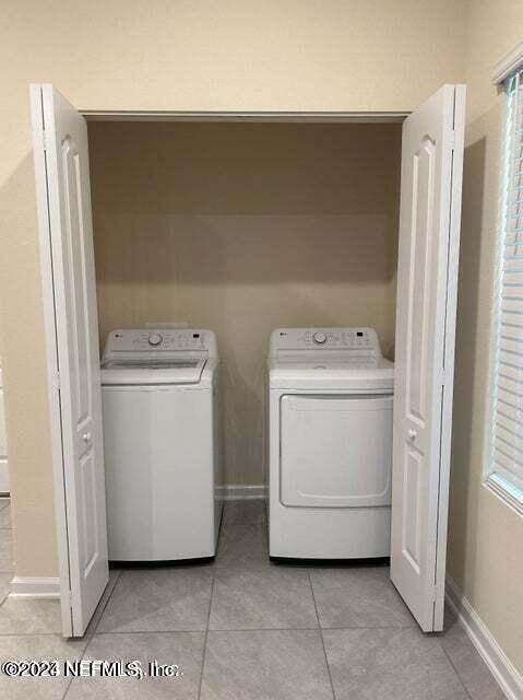 59 Sunnyvale Street St. Augustine, FL 32095 - Photo 6 of 22 a utility room with dryer and washer