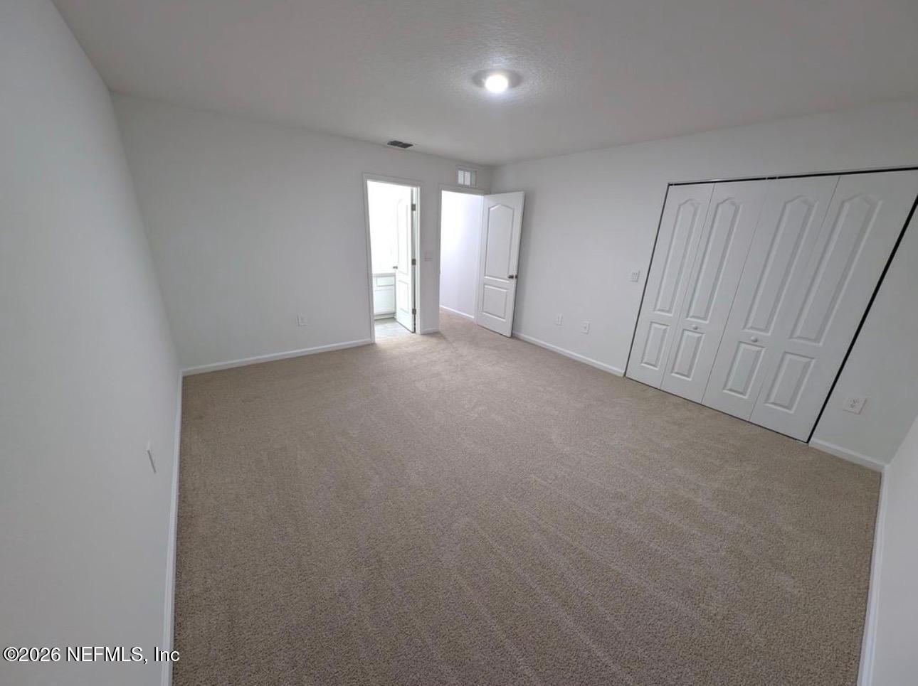 59 Sunnyvale Street St. Augustine, FL 32095 - Photo 8 of 22 a view of an empty room and a window