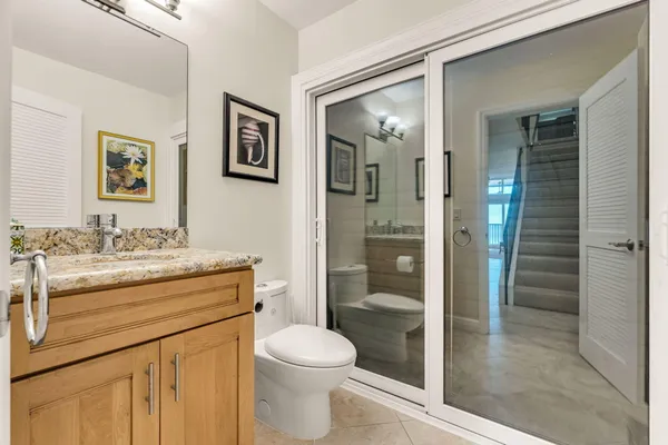 a view of balcony with a potted plant