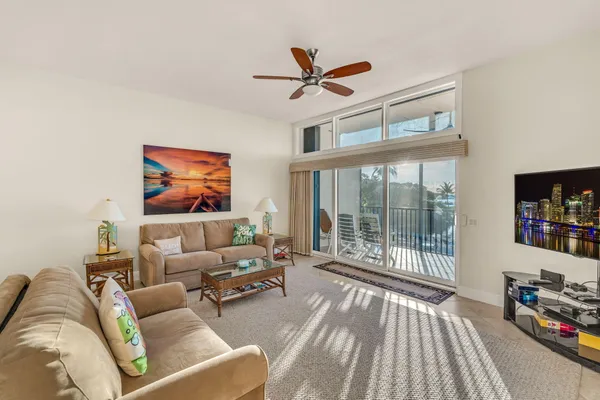 a kitchen with kitchen island granite countertop a sink and counter space