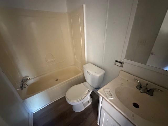 45 Banister Drive Northeast Rome, GA 30161 - Photo 17 of 19 a white toilet sitting next to a bathroom sink