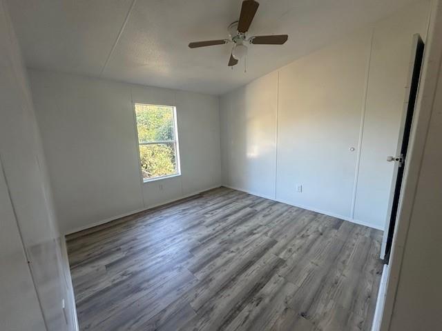 45 Banister Drive Northeast Rome, GA 30161 - Photo 18 of 19 wooden floor in an empty room with a window