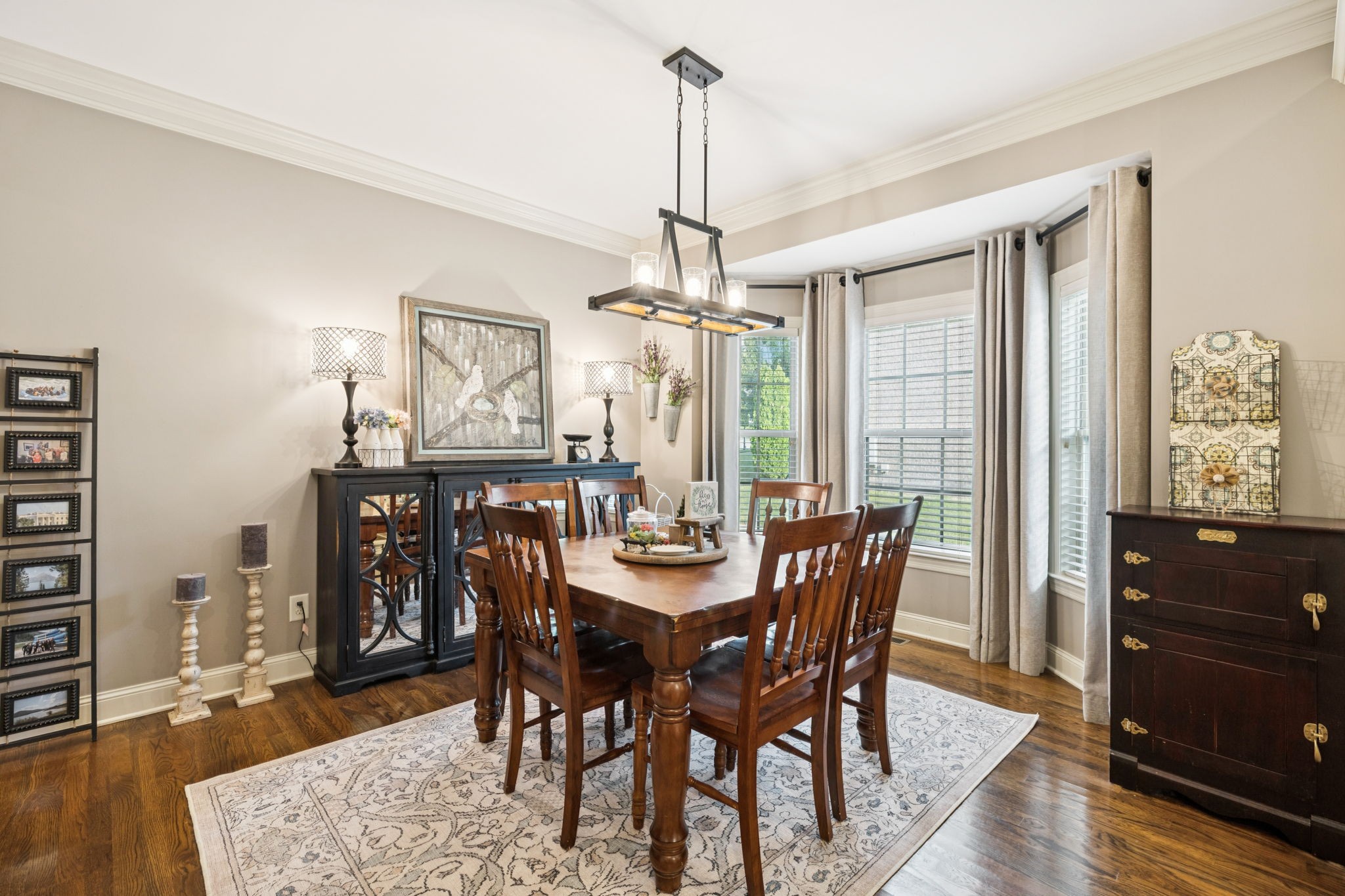 4003 Campania Strada Spring Hill, TN 37174 - Photo 23 of 50 a view of a dining room with furniture window and wooden floor