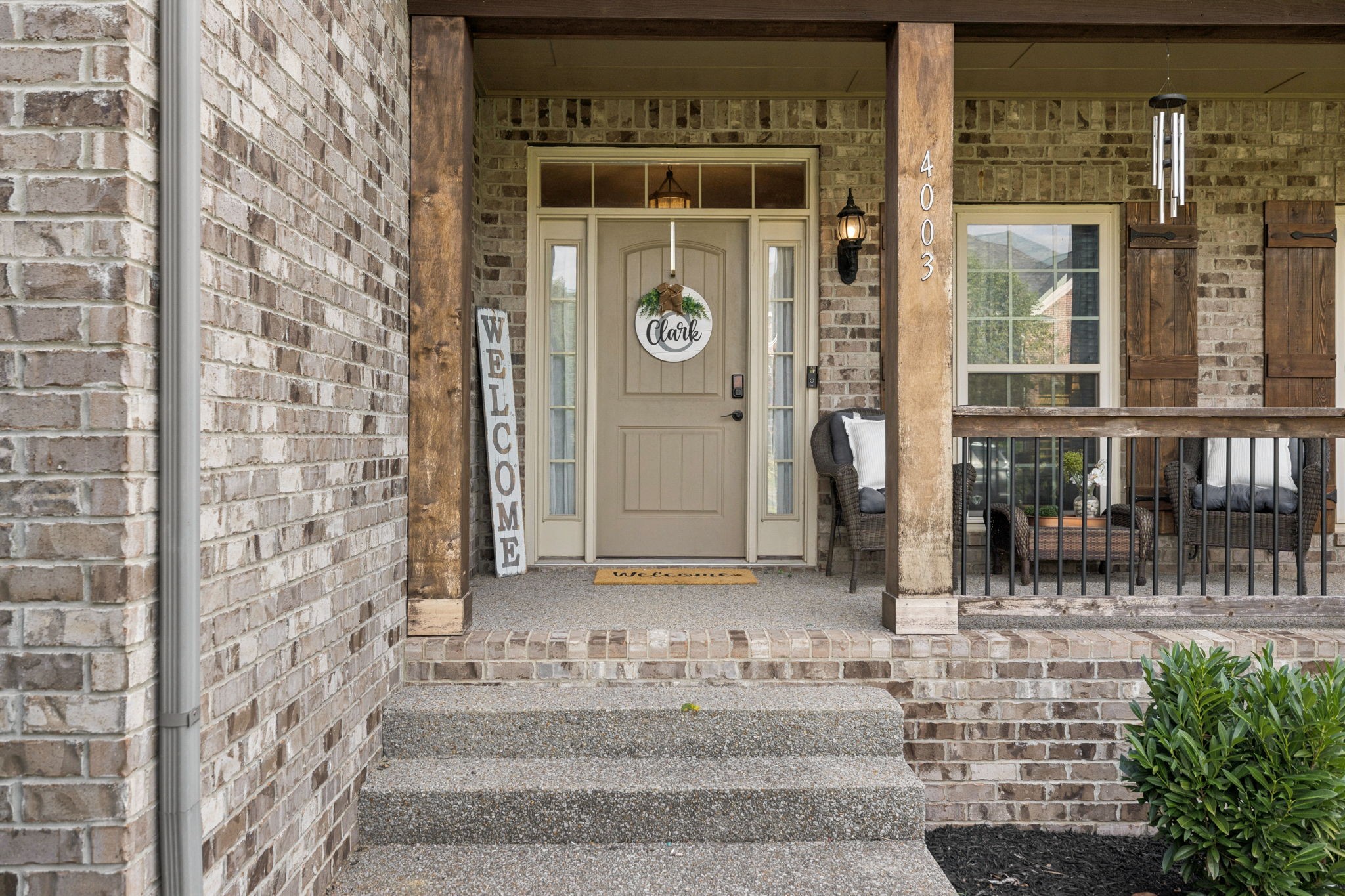 4003 Campania Strada Spring Hill, TN 37174 - Photo 4 of 50 a front view of a building with glass door