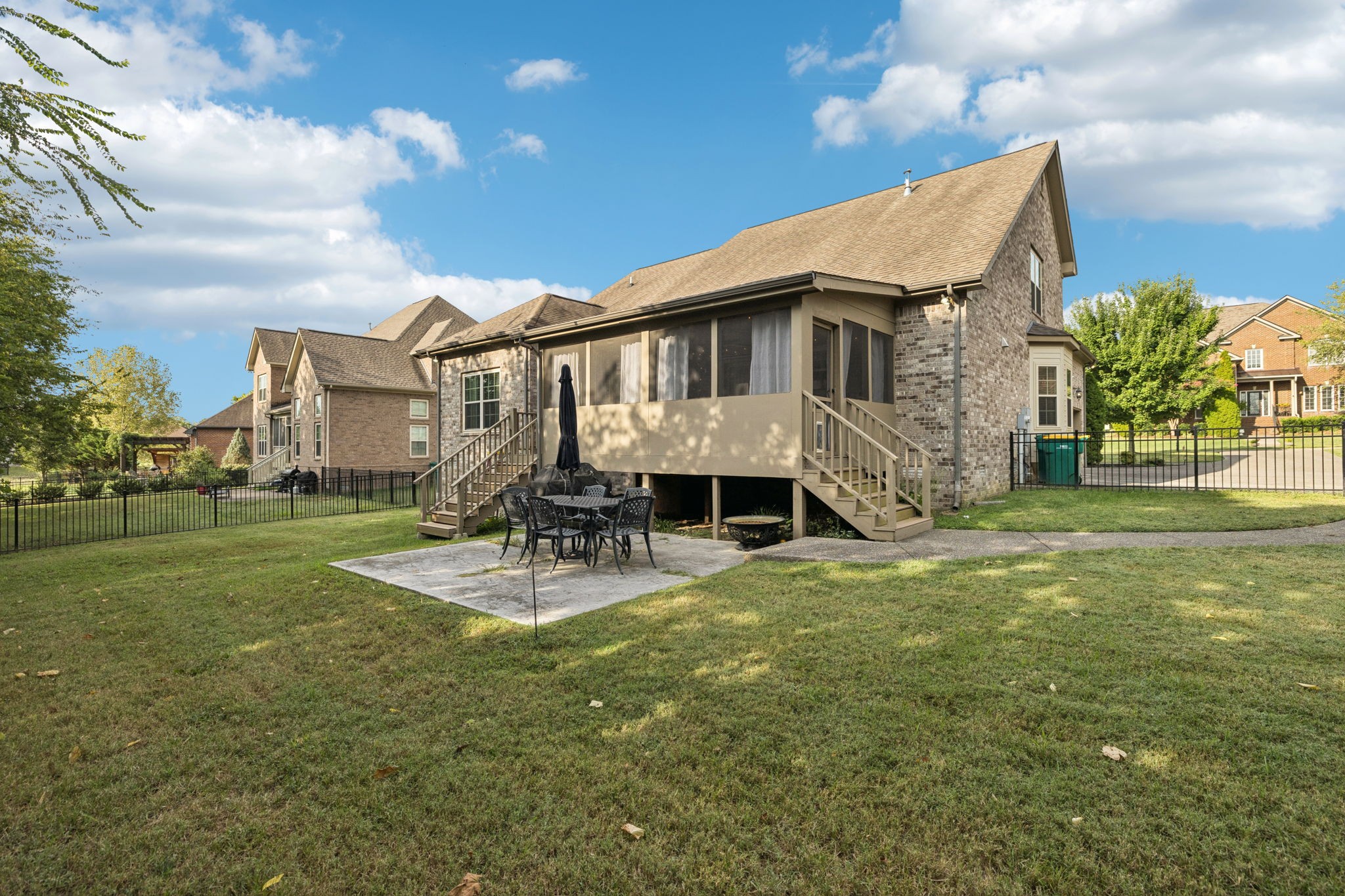 4003 Campania Strada Spring Hill, TN 37174 - Photo 48 of 50 a view of a house with a big yard and sitting area