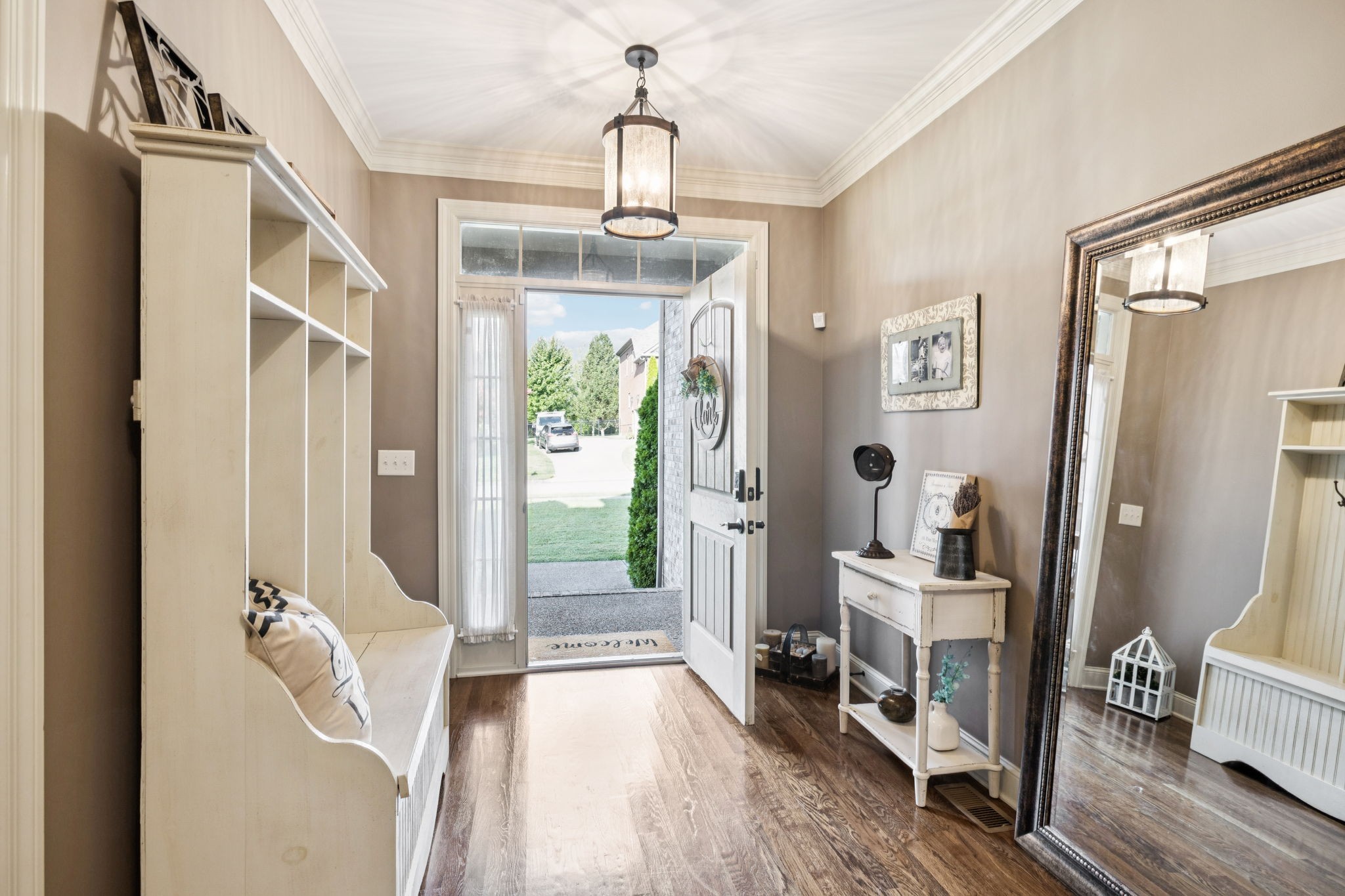 4003 Campania Strada Spring Hill, TN 37174 - Photo 7 of 50 a very nice looking room with a dining table a chandelier