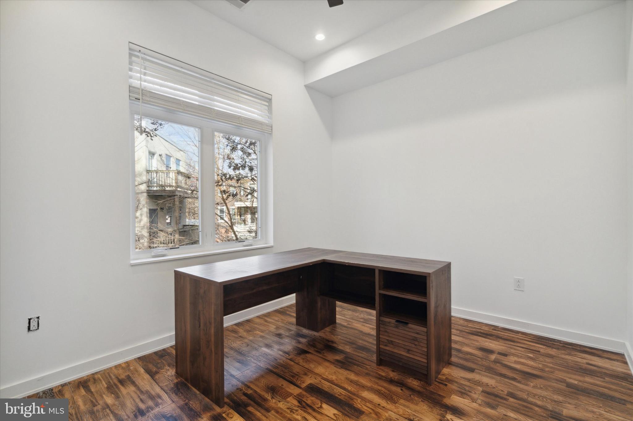 1825 Ginnodo Street, Unit R2 Philadelphia, PA 19130 - Photo 18 of 38 a room with table and window