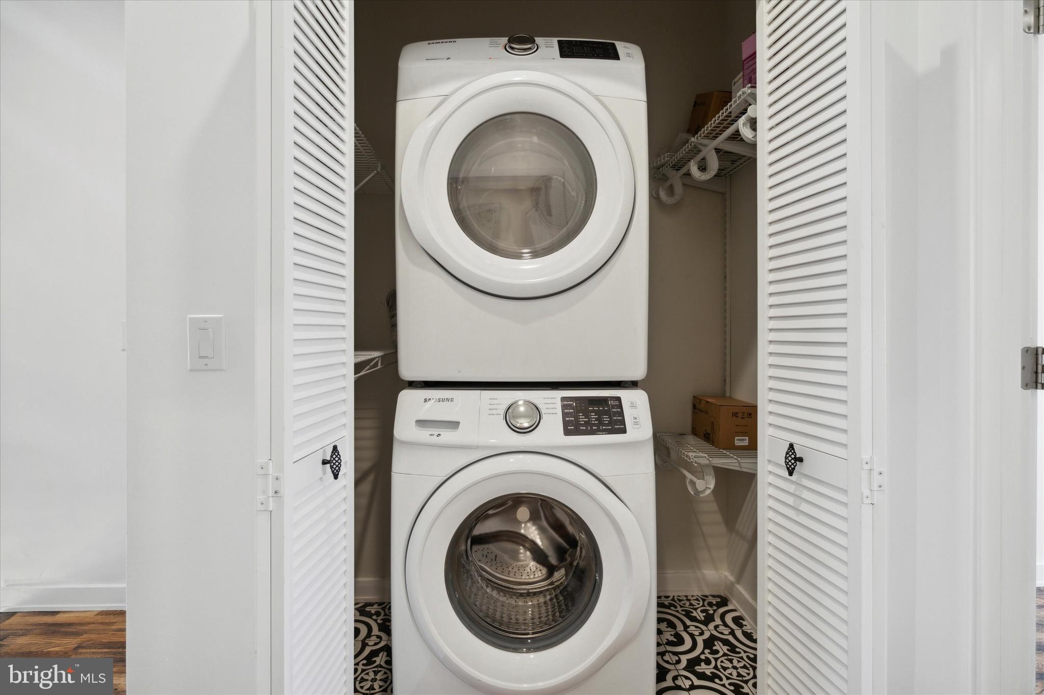 1825 Ginnodo Street, Unit R2 Philadelphia, PA 19130 - Photo 30 of 38 a utility room with dryer and washer
