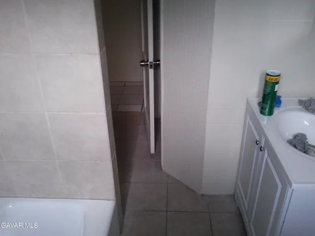 a bathroom with a shower and toilet