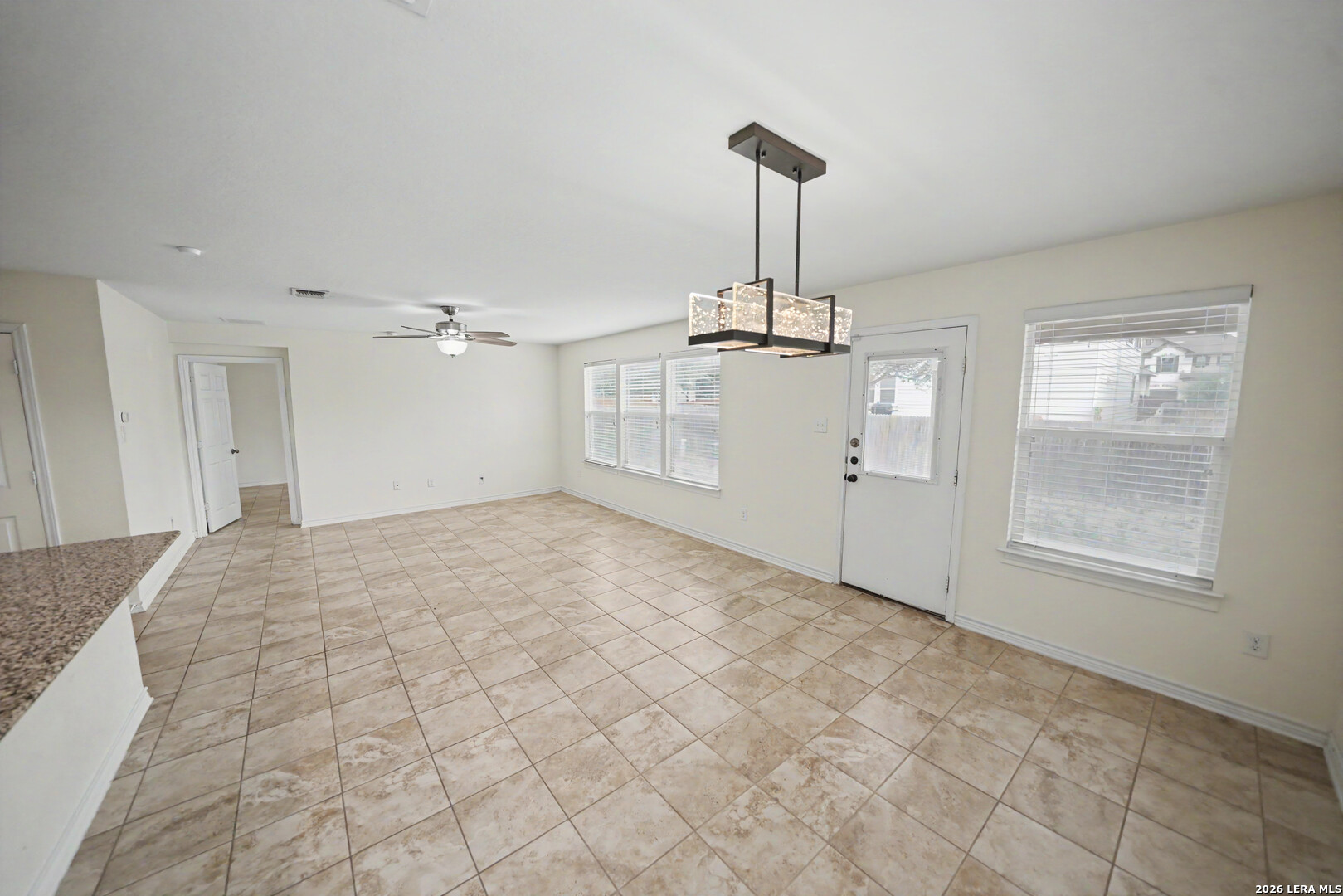 7506 Copper Cove Converse, TX 78109 - Photo 12 of 45 a view of empty room with windows