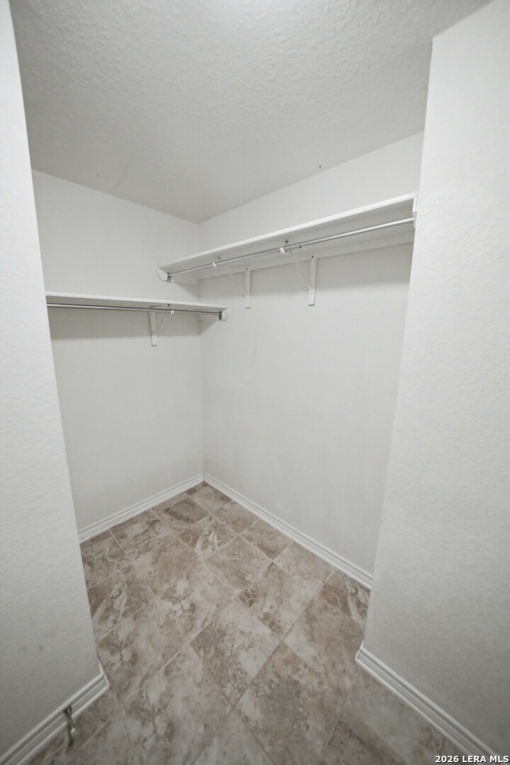 7506 Copper Cove Converse, TX 78109 - Photo 26 of 45 a view of an empty walk in closet