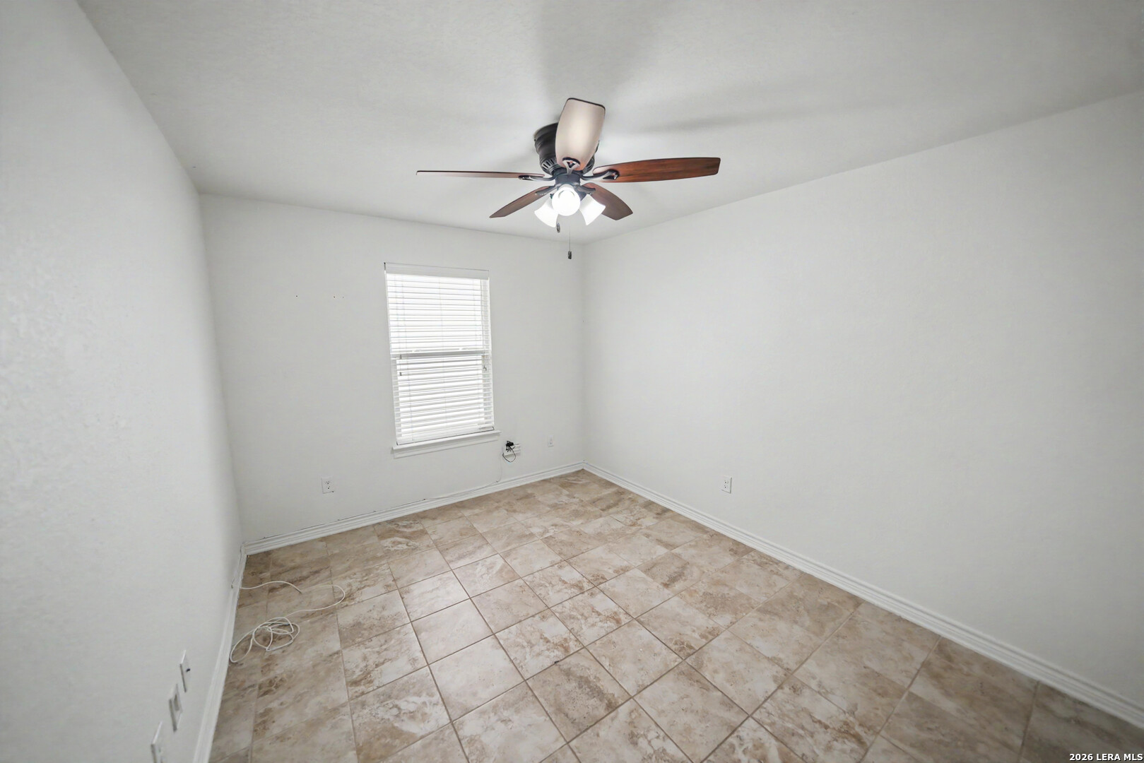 7506 Copper Cove Converse, TX 78109 - Photo 33 of 45 an empty room with windows and fan