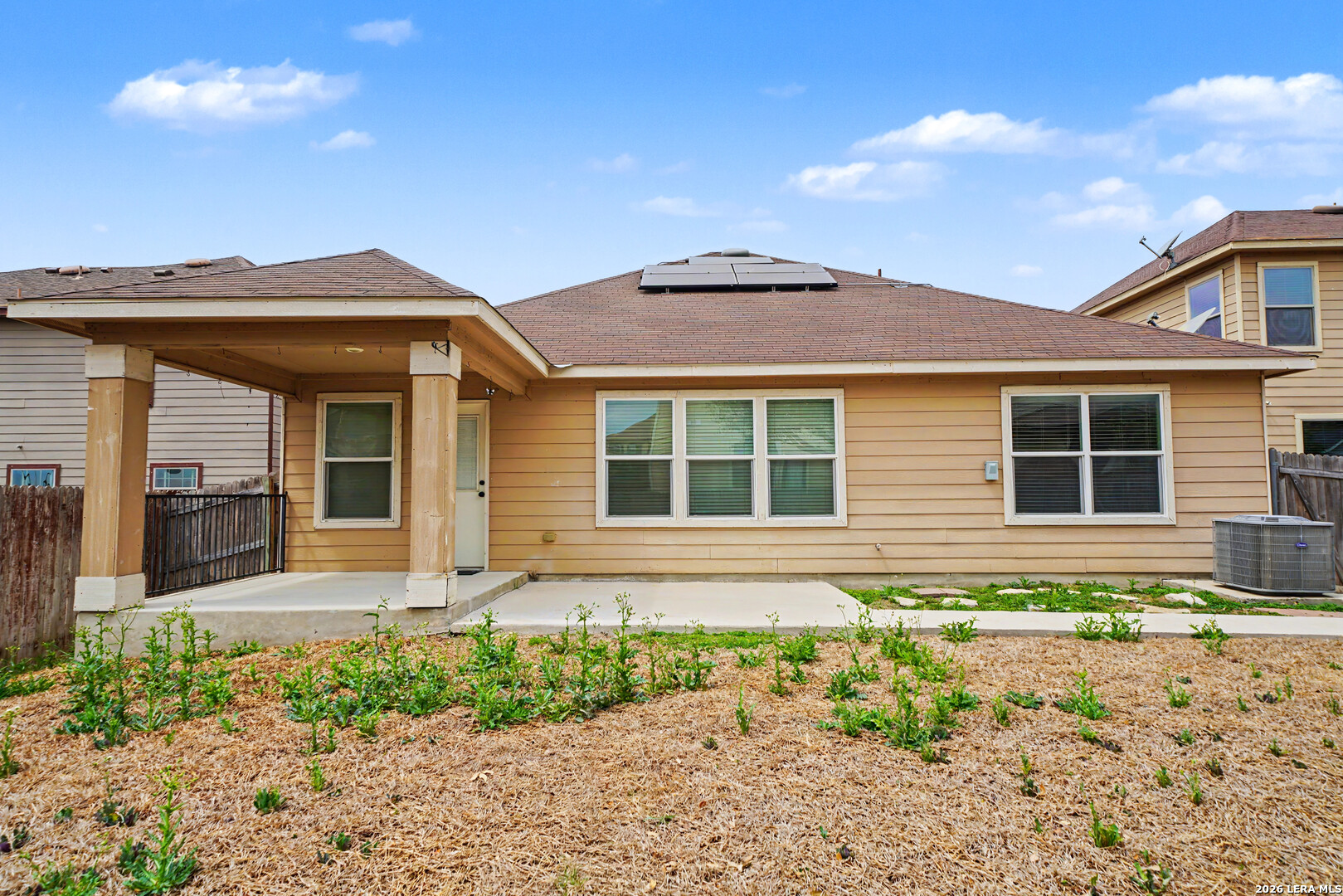 7506 Copper Cove Converse, TX 78109 - Photo 40 of 45 a front view of a house with a yard