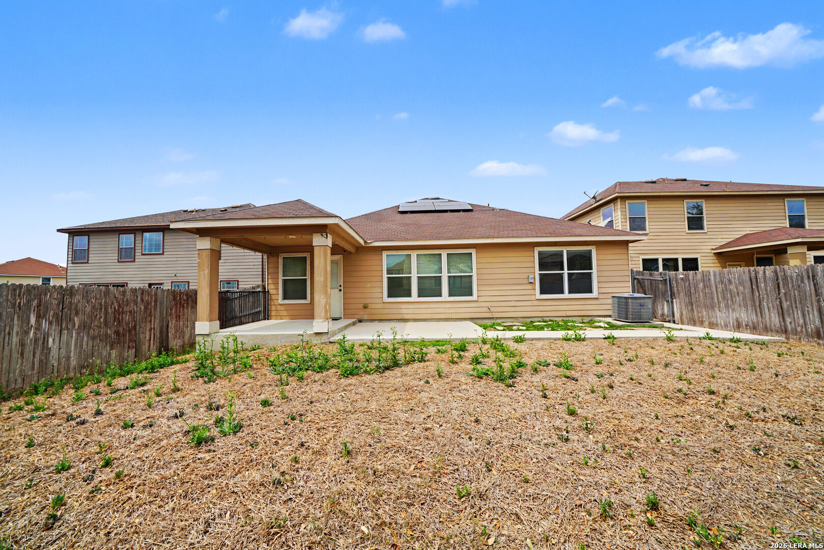 7506 Copper Cove Converse, TX 78109 - Photo 41 of 45 a front view of a house with a yard