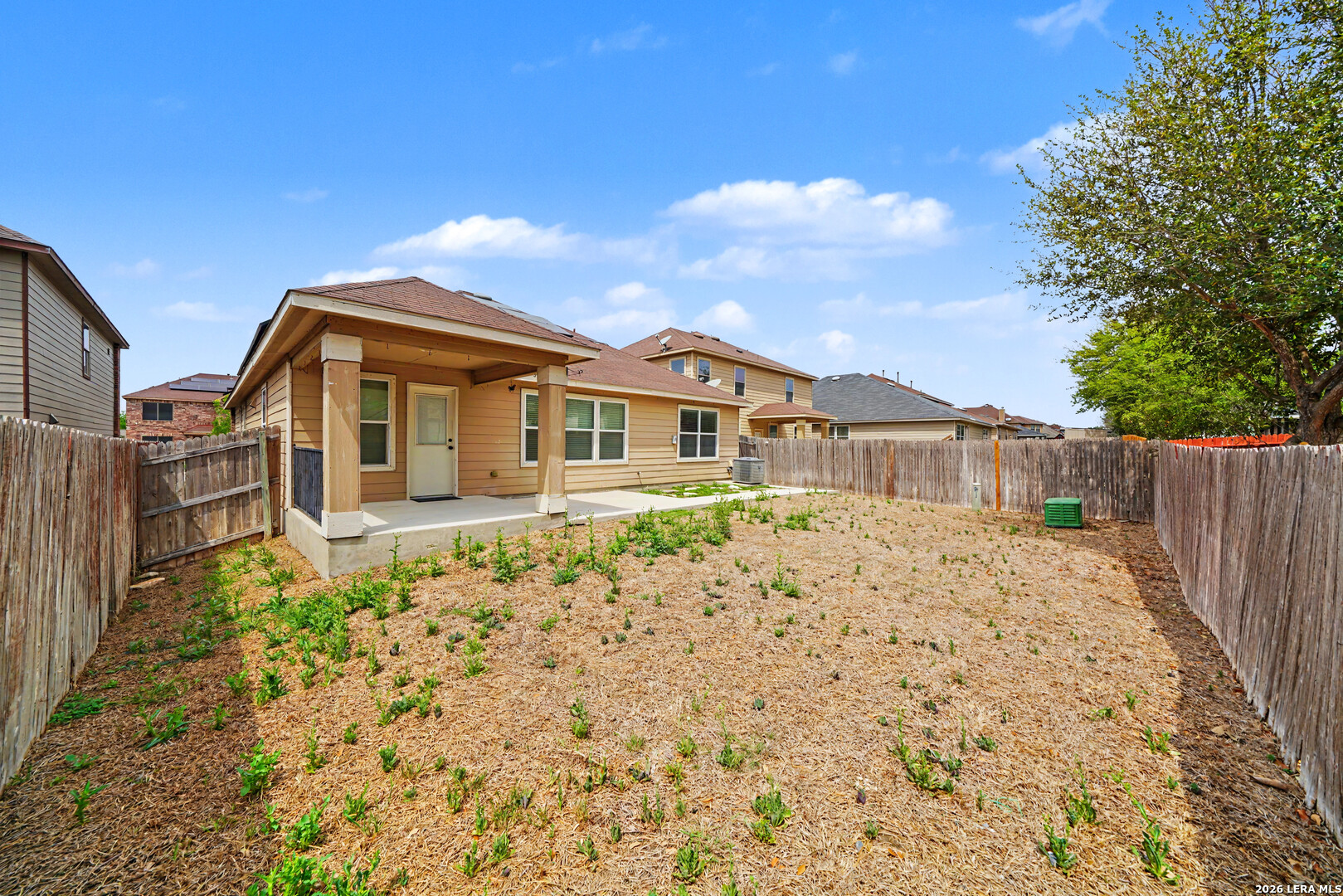 7506 Copper Cove Converse, TX 78109 - Photo 43 of 45 a front view of a house with a garden
