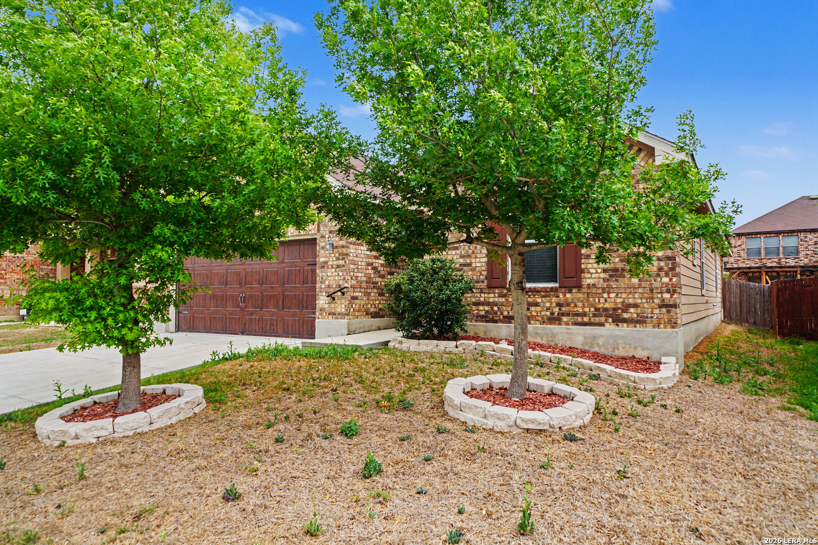 7506 Copper Cove Converse, TX 78109 - Photo 5 of 45 a backyard of a house with table and chairs