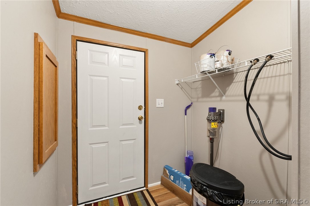 2944 Ferree Road Northeast Lanesville, IN 47136 - Photo 63 of 64 Utility room with door to back deck