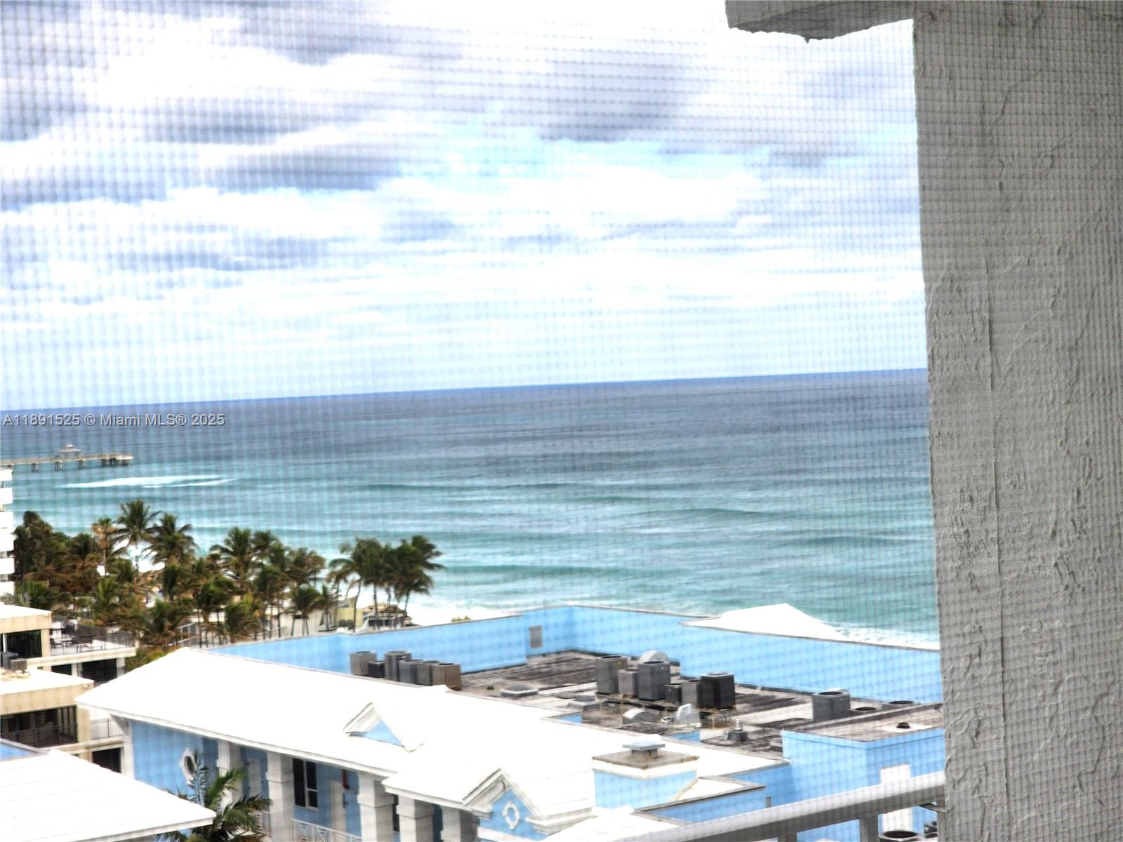 800 Southeast 20th Avenue, Unit 1109 Deerfield Beach, FL 33441 - Photo 13 of 19 a view of terrace with wooden floor