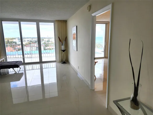 a white tub sitting next to a white sink