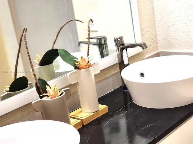 a bathroom with a shower and a bathtub