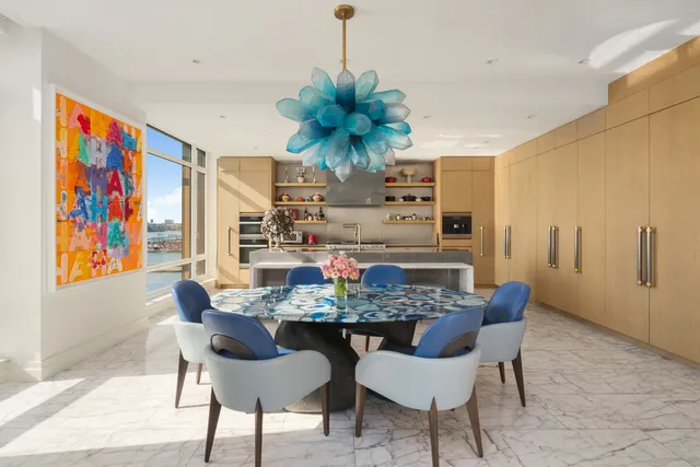 a kitchen with stainless steel appliances granite countertop a stove and a sink