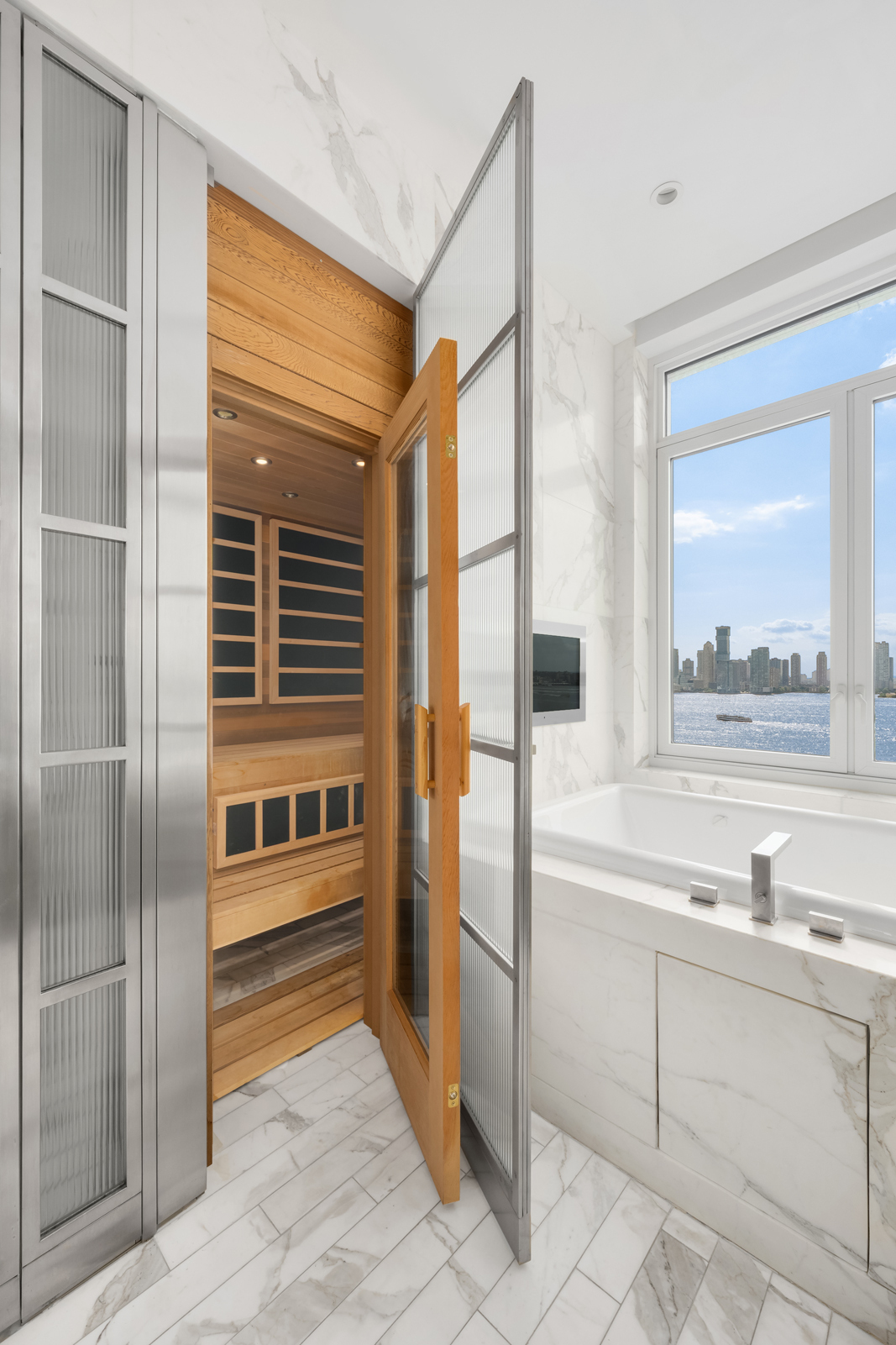 70 Vestry Street, Unit PHS Manhattan, NY 10013 - Photo 22 of 34 a view of cabinets and window