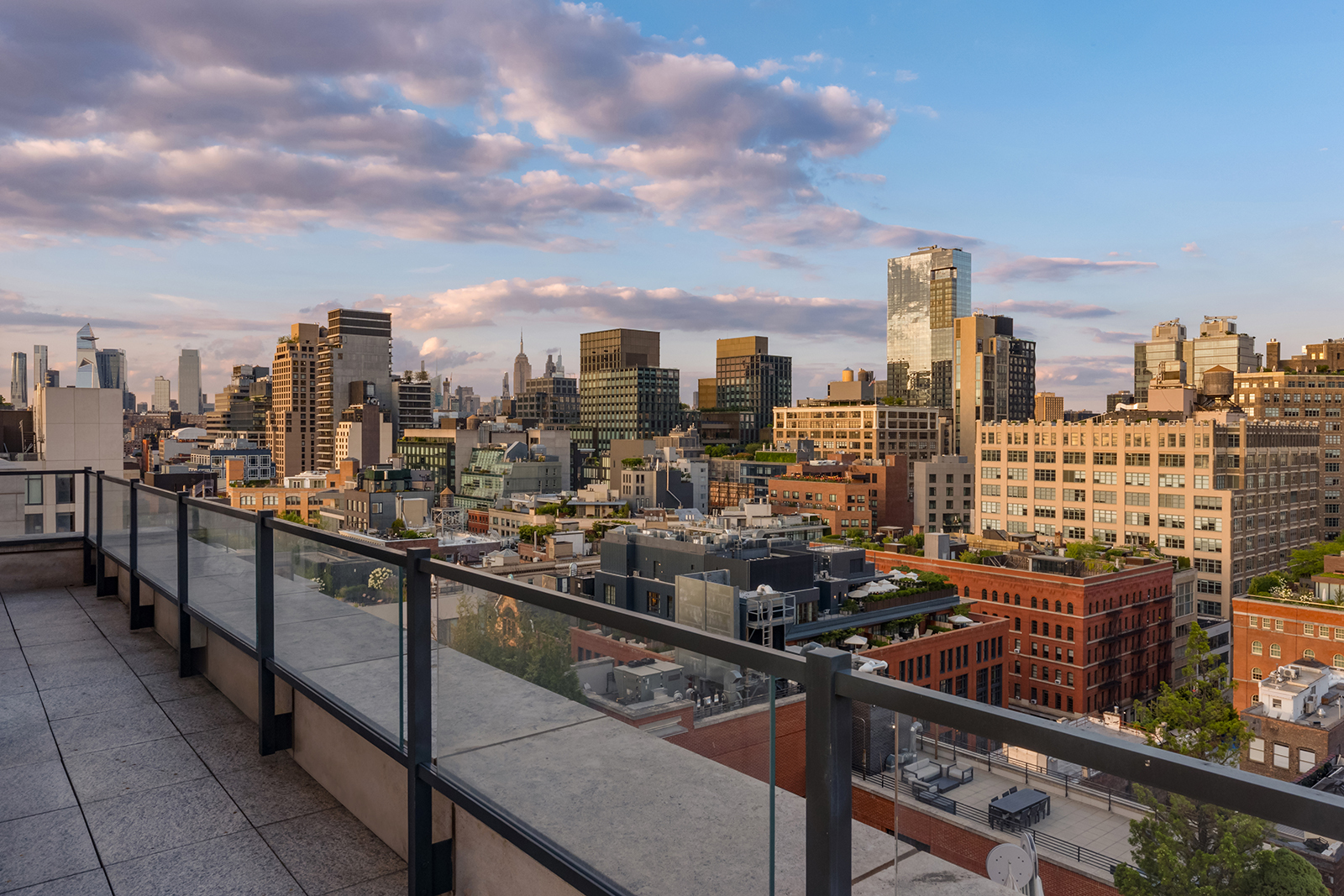 70 Vestry Street, Unit PHS Manhattan, NY 10013 - Photo 24 of 34 a view of a city from a balcony