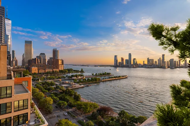 a view of swimming pool from a balcony