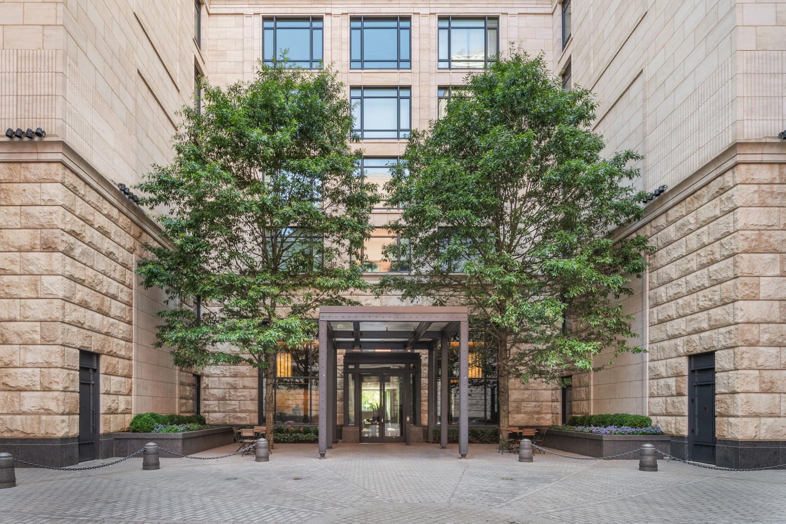 70 Vestry Street, Unit PHS Manhattan, NY 10013 - Photo 31 of 34 a front view of a building with trees