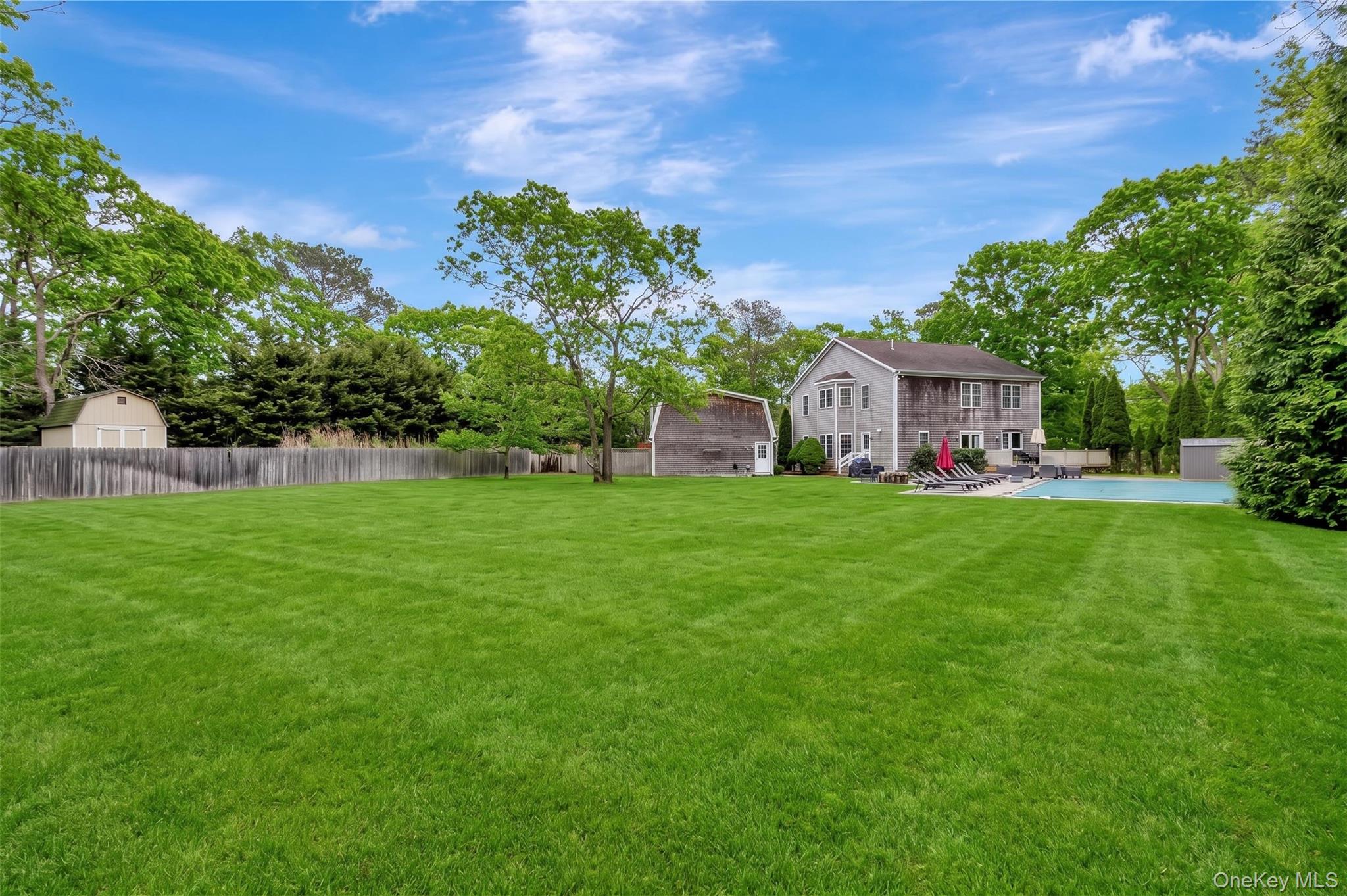26 Box Tree Road East Quogue, NY 11942 - Photo 7 of 49 a front view of house with garden