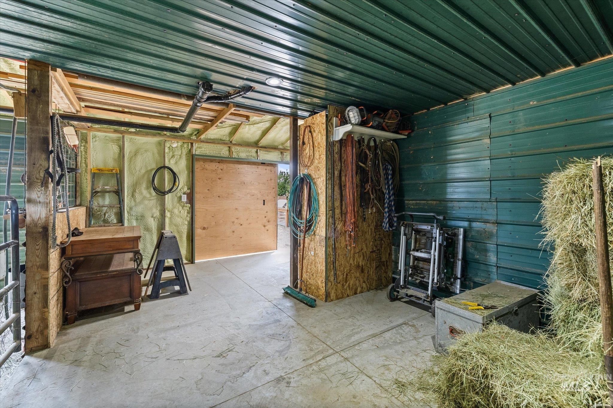 1140 Edgemont Road Emmett, ID 83617 - Photo 43 of 50 Concrete flooring with a green metal ceiling