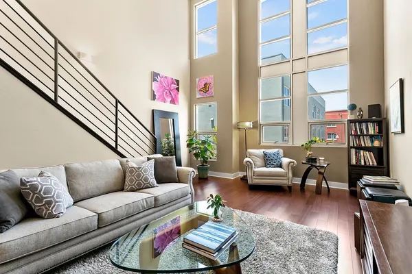 a living room with furniture or couch and a bookshelf