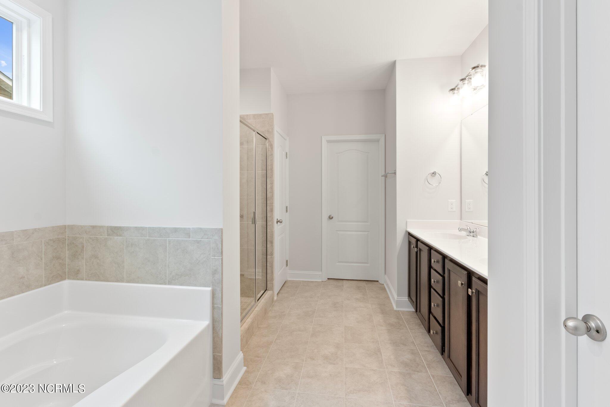 9060 Gardens Grove Road Leland, NC 28451 - Photo 12 of 28 PRIMARY BATHROOM